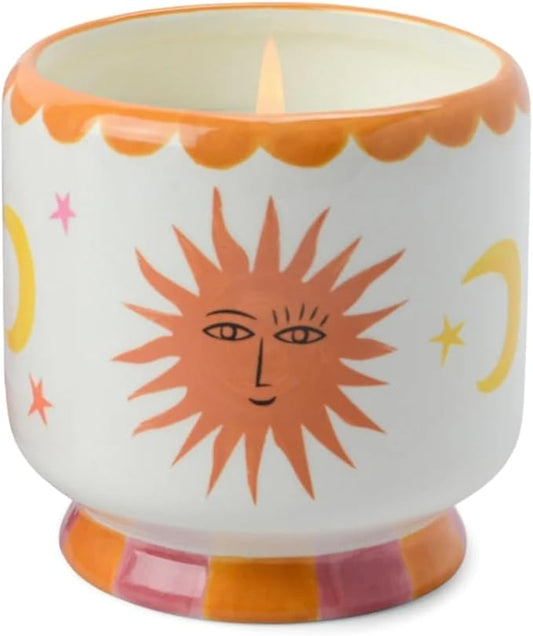 A DOPO 8 OZ HANDPAINTED "SUN" CANDLE- ORANGE BLOSSOM